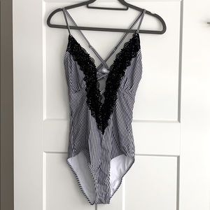 One piece striped bathing suit Size M